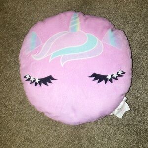 Small circular unicorn pillow